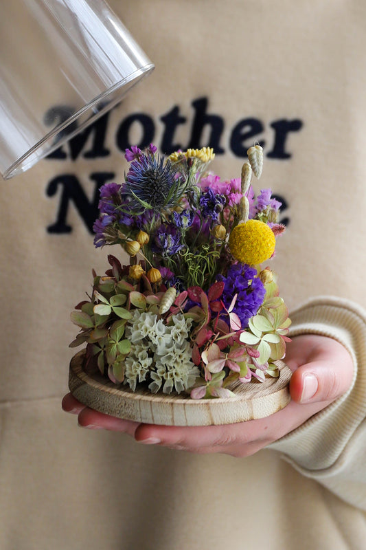 Fleurs séchées sous cloche